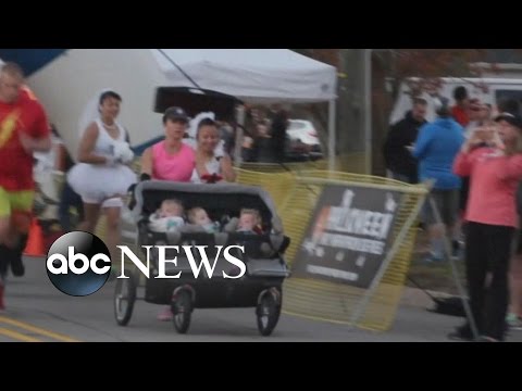 بالفيديو أميركية تشارك في ماراثون بصحبة صغارها التوائم الرضع