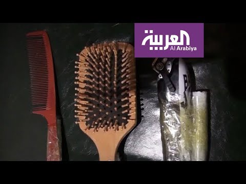 الحلاقة عن بُعد في أحدث طريقة للوقاية من كورونا في الصين