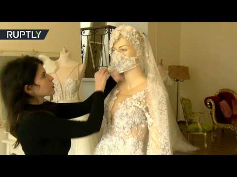 خياطة كمامات تُناسب فساتين الزفاف وتقي العروس من عدوى كورونا