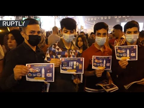 آلاف المتظاهرين يُطالبون بحظر المنتجات الفرنسية في بغداد
