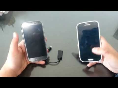 شاهد طريقة بسيطة لشحن هاتفك من هاتف آخر