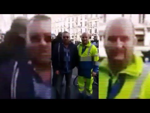 البحري يلتقط صورة مع رجل نظافة مغربي في باريس