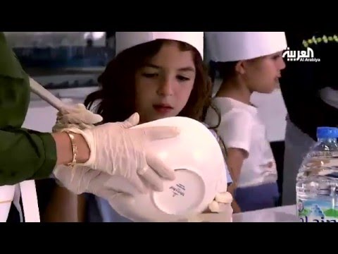 ورشة لتعليم الأمهات فنون صنع الحلويات